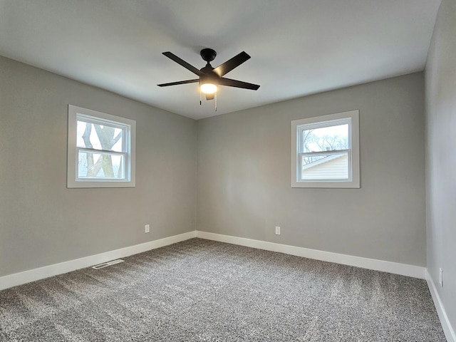 919 Dartmouth Ave, Matteson, IL 60443 - empty room featuring baseboards, carpet floors, and a healthy amount of sunlight