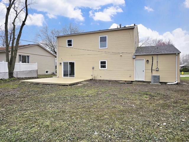 919 Dartmouth Ave, Matteson, IL 60443 - back of property with central AC unit, fence, and a patio