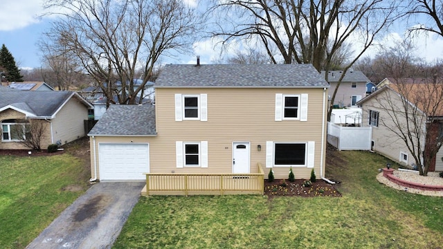 919 Dartmouth Ave, Matteson, IL 60443 - view of front facade featuring aphalt driveway, fence, a garage, a front yard, and roof with shingles