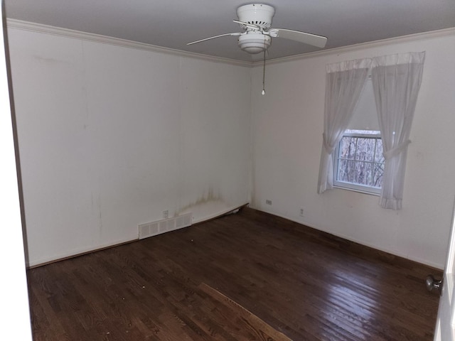 1122 Foster Ave, Lake Bluff, IL 60044 - unfurnished room featuring visible vents, wood finished floors, ornamental molding, and ceiling fan