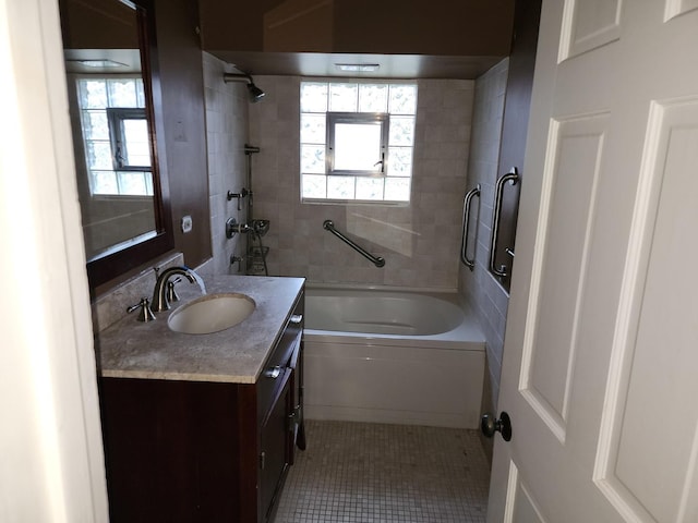 1122 Foster Ave, Lake Bluff, IL 60044 - full bath with tile patterned floors, vanity, tub / shower combination, and a wealth of natural light