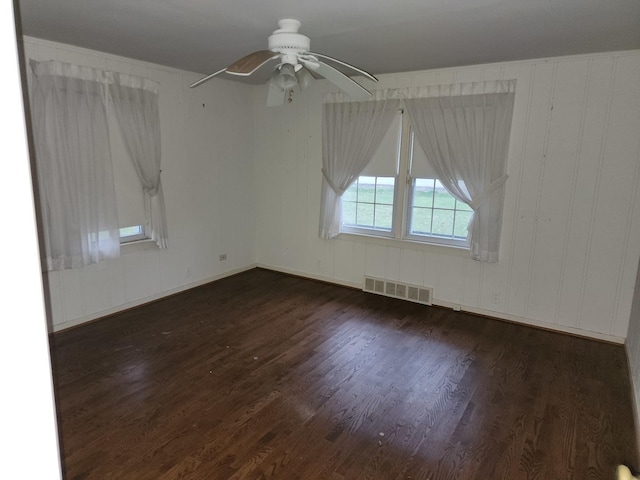 1122 Foster Ave, Lake Bluff, IL 60044 - spare room featuring wood finished floors, baseboards, a ceiling fan, and visible vents