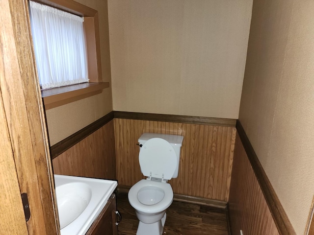 1122 Foster Ave, Lake Bluff, IL 60044 - bathroom featuring toilet, vanity, a wainscoted wall, and wood finished floors