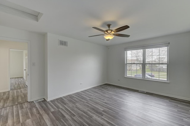 12525 S Central Park Ave, Alsip, IL 60803 - empty room featuring baseboards, visible vents, wood finished floors, and a ceiling fan
