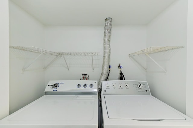 12525 S Central Park Ave, Alsip, IL 60803 - clothes washing area with washing machine and clothes dryer and laundry area