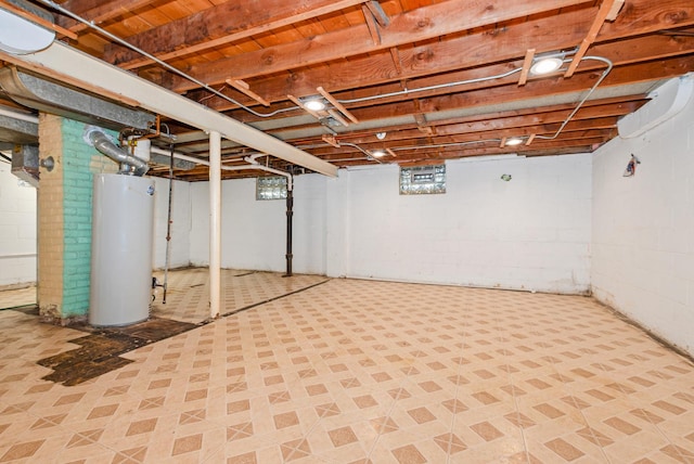 674 Memorial Dr, Calumet City, IL 60409 - basement featuring water heater and tile patterned floors
