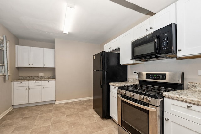 674 Memorial Dr, Calumet City, IL 60409 - kitchen featuring white cabinets, baseboards, black appliances, and light stone counters