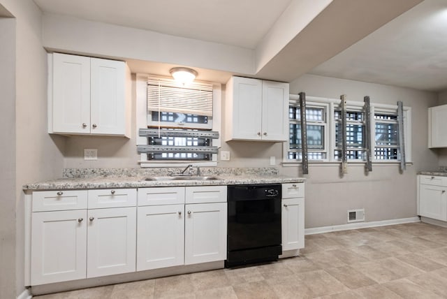 674 Memorial Dr, Calumet City, IL 60409 - kitchen with white cabinets, dishwasher, a sink, and visible vents