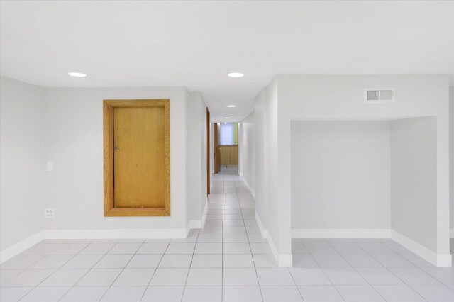 3338 S Bell Ave, Chicago, IL 60608 - hallway with light tile patterned floors, recessed lighting, baseboards, and visible vents