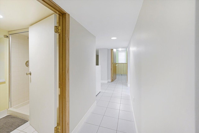 3338 S Bell Ave, Chicago, IL 60608 - hallway with light tile patterned flooring, baseboards, and recessed lighting