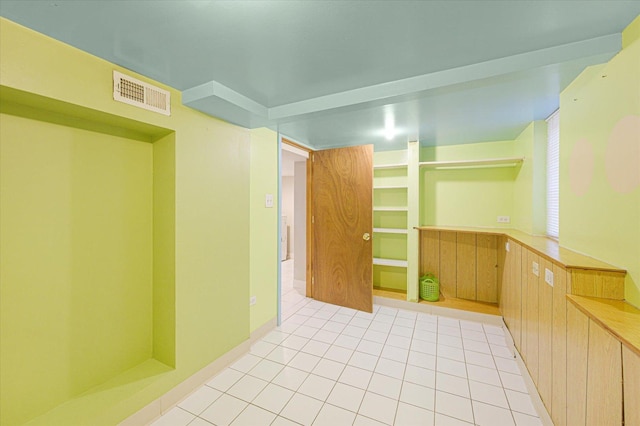 3338 S Bell Ave, Chicago, IL 60608 - unfurnished room featuring visible vents and light tile patterned floors