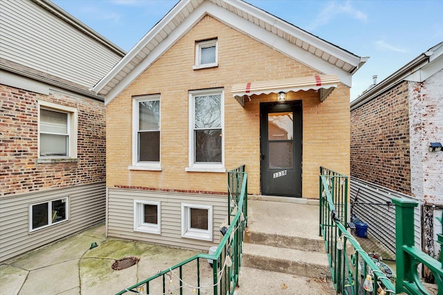 3338 S Bell Ave, Chicago, IL 60608 - entrance to property with brick siding and a patio