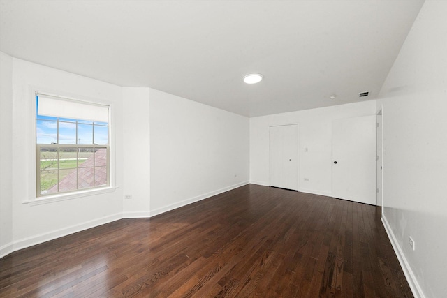 286 Sunset Blvd, Beecher, IL 60401 - empty room featuring baseboards and dark wood-style floors