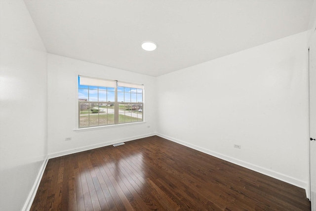 286 Sunset Blvd, Beecher, IL 60401 - unfurnished room with dark wood-type flooring, baseboards, and visible vents
