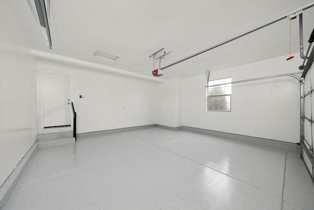 286 Sunset Blvd, Beecher, IL 60401 - garage with baseboards and a garage door opener