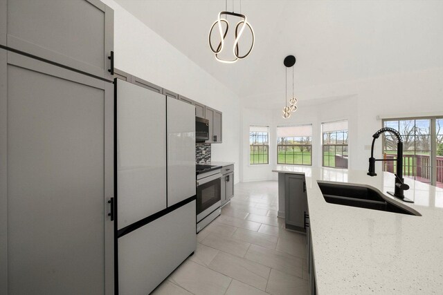 286 Sunset Blvd, Beecher, IL 60401 - kitchen featuring white range oven, plenty of natural light, a sink, and stainless steel microwave