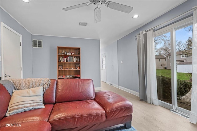 6914 Richmond Ave, Darien, IL 60561 - living room featuring light wood-style flooring, visible vents, baseboards, recessed lighting, and a ceiling fan