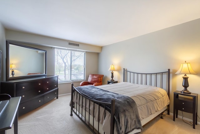 1505 E Central Rd Unit 211B, Arlington Heights, IL 60005 - bedroom featuring light colored carpet and baseboards
