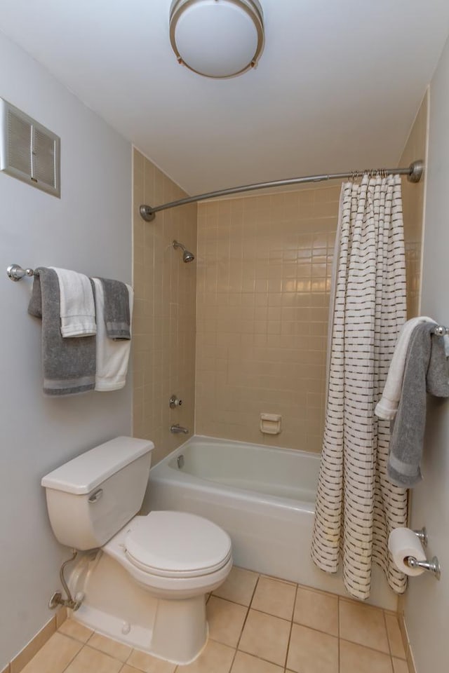 1505 E Central Rd Unit 211B, Arlington Heights, IL 60005 - full bathroom featuring tile patterned floors, toilet, and shower / tub combo with curtain