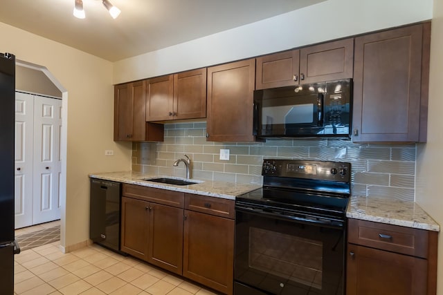 1505 E Central Rd Unit 211B, Arlington Heights, IL 60005 - kitchen featuring black appliances, a sink, decorative backsplash, and light tile patterned floors