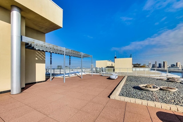 500 W Superior St Unit 1804, Chicago, IL 60654 - view of patio / terrace with a fire pit and a view of city