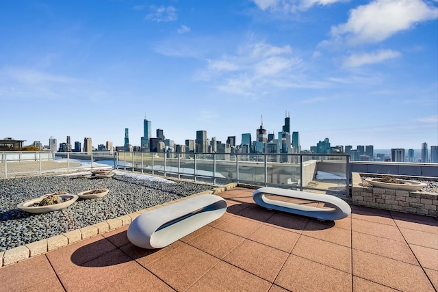 500 W Superior St Unit 1804, Chicago, IL 60654 - view of patio featuring a view of skyline and an outdoor fire pit