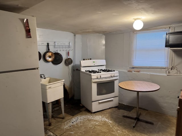 4221 N Sawyer Ave, Chicago, IL 60618 - kitchen with a sink and white appliances