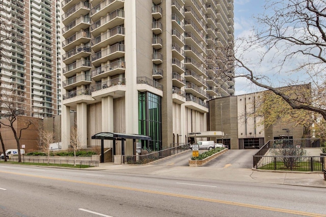 view of building exterior featuring fence