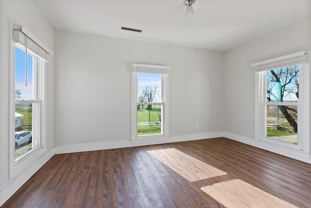 103 E 1400 N Rd, Danvers, IL 61732 - empty room with wood finished floors and baseboards