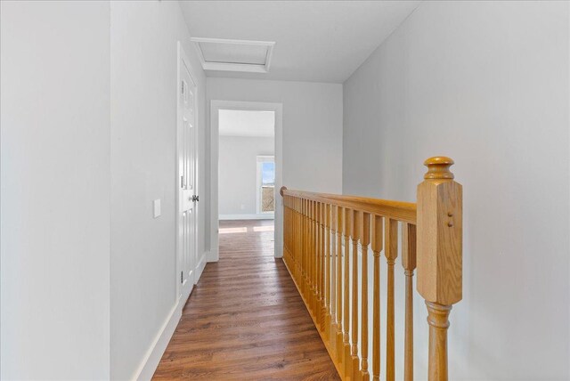 103 E 1400 N Rd, Danvers, IL 61732 - hall with an upstairs landing, wood finished floors, attic access, and baseboards