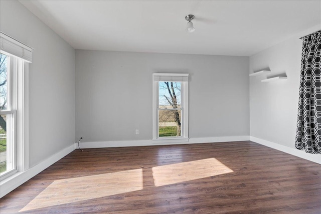 103 E 1400 N Rd, Danvers, IL 61732 - spare room featuring healthy amount of natural light, wood finished floors, and baseboards