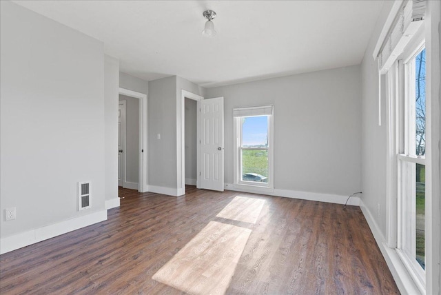 103 E 1400 N Rd, Danvers, IL 61732 - unfurnished room featuring wood finished floors and baseboards