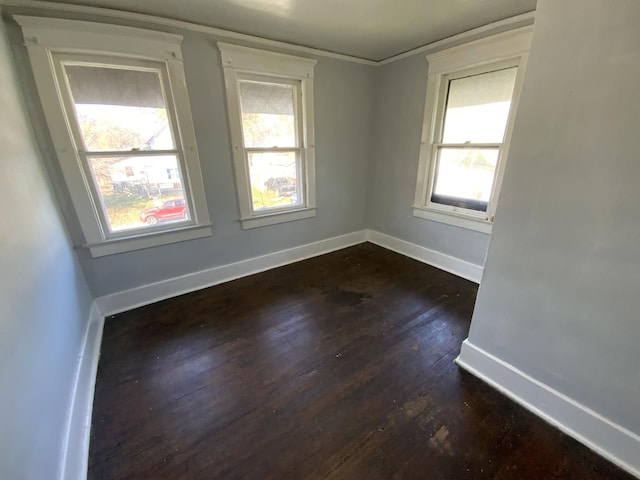 405 Chandler St, Danville, IL 61832 - spare room with dark wood finished floors and baseboards
