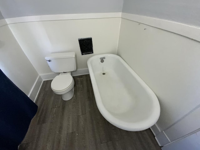 405 Chandler St, Danville, IL 61832 - full bath with baseboards, a tub, wood finished floors, and toilet