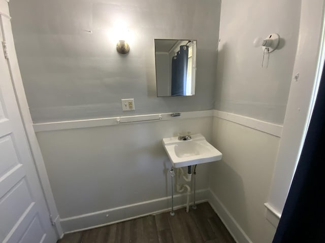 405 Chandler St, Danville, IL 61832 - bathroom with a sink, baseboards, and wood finished floors