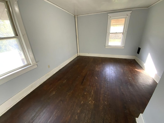 405 Chandler St, Danville, IL 61832 - spare room featuring baseboards and wood-type flooring
