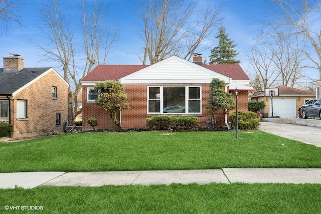 270 W 10th St, Chicago Heights, IL 60411 - view of front facade with brick siding, an outdoor structure, and a front yard
