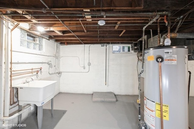 270 W 10th St, Chicago Heights, IL 60411 - below grade area featuring water heater and a sink