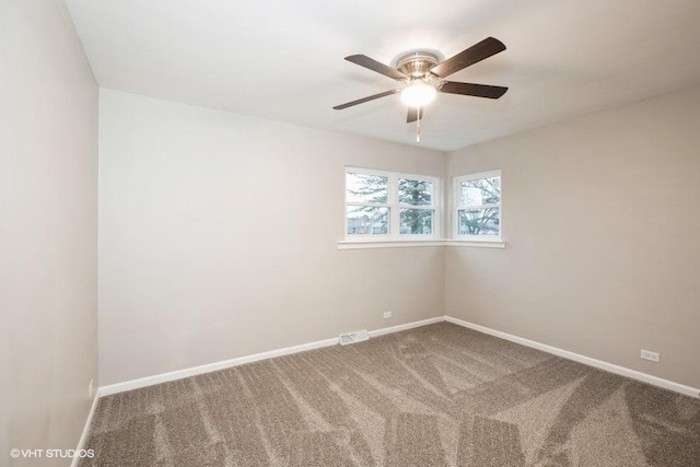 270 W 10th St, Chicago Heights, IL 60411 - empty room with baseboards, visible vents, carpet, and a ceiling fan