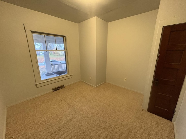 716 Robinson St, Danville, IL 61832 - unfurnished room featuring light colored carpet and baseboards