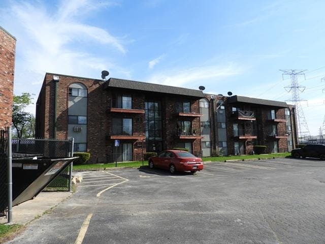13715 S Stewart Ave Unit 2E, Riverdale, IL 60827 - view of property with uncovered parking