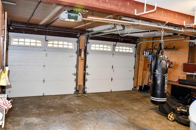 garage featuring a garage door opener