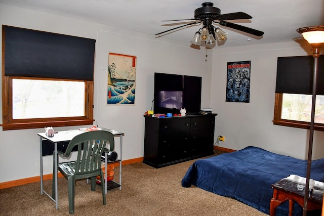 bedroom featuring baseboards and carpet flooring
