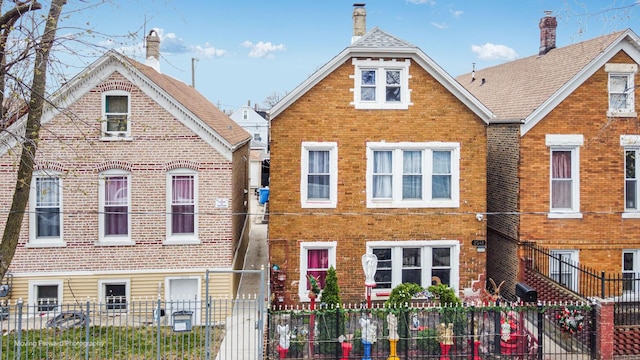 3041 S Drake Ave, Chicago, IL 60623 - view of front of property featuring brick siding and a fenced front yard