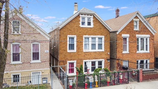 3041 S Drake Ave, Chicago, IL 60623 - view of front facade with brick siding and a fenced front yard