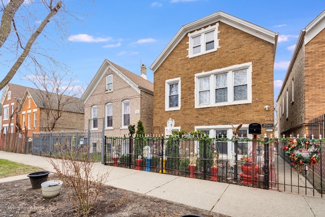 3041 S Drake Ave, Chicago, IL 60623 - view of front of home with brick siding and a fenced front yard