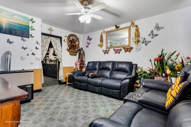 3041 S Drake Ave, Chicago, IL 60623 - living area featuring a wainscoted wall, wood walls, and a ceiling fan