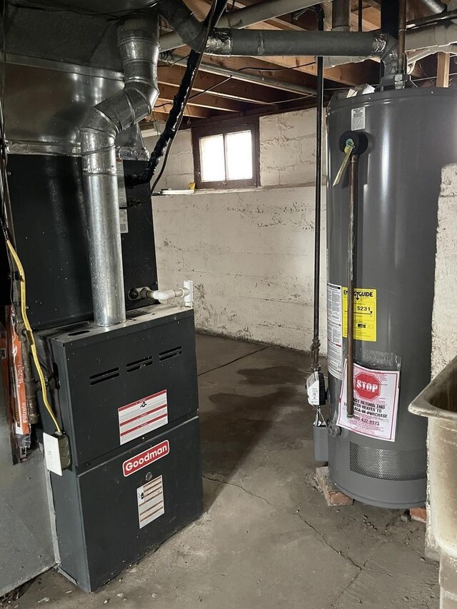 utilities featuring heating unit and gas water heater