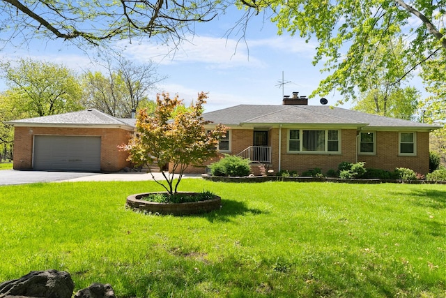 3315 E Bemes Rd, Crete, IL 60417 - ranch-style home featuring brick siding, a garage, a front lawn, driveway, and a chimney