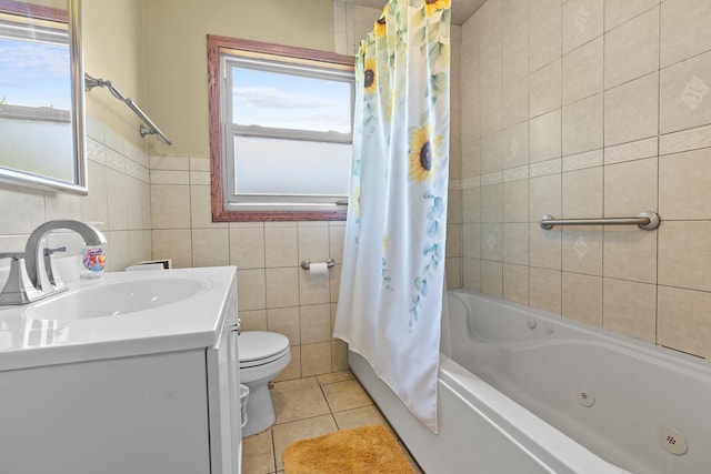 3315 E Bemes Rd, Crete, IL 60417 - bathroom featuring tile walls, plenty of natural light, toilet, tile patterned floors, and vanity